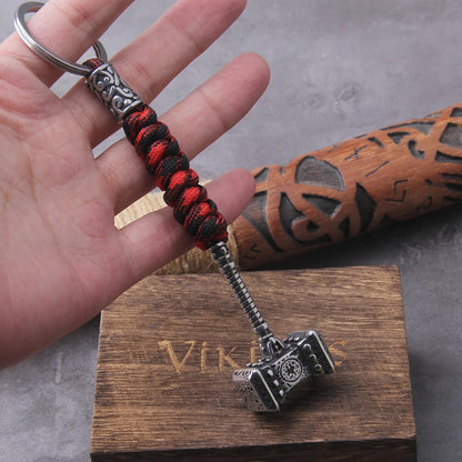 Viking-inspired survival keychain with Thors Hammer, stainless steel anchor knife pendant, and handmade Norse jewelry