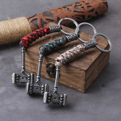 Viking-inspired survival keychain with Thors Hammer, stainless steel anchor knife pendant, and handmade Norse jewelry