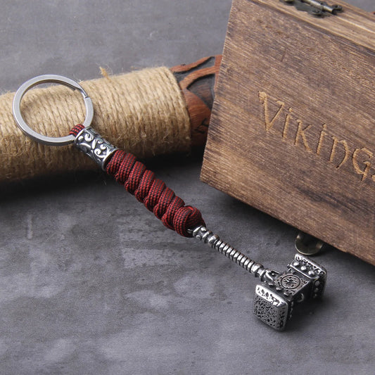 Viking-inspired survival keychain with Thors Hammer, stainless steel anchor knife pendant, and handmade Norse jewelry